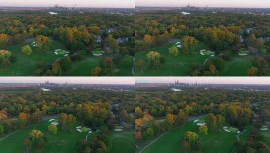 秋天日落时的美国高尔夫球场。远处的费城天际线。高清在线视频素材下载