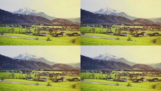 郁郁葱葱的绿色山谷中的阿尔卑斯山村庄高清在线视频素材下载
