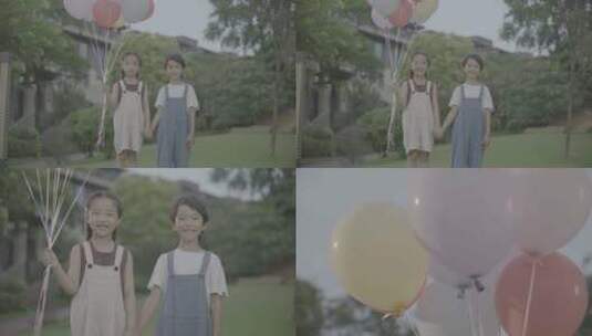 4K Log 小孩手拿气球开心的微笑高清在线视频素材下载