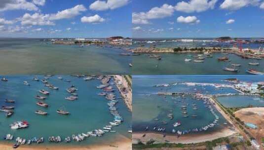航拍威海市高新区小石岛渔港渔船蓝天白云高清在线视频素材下载