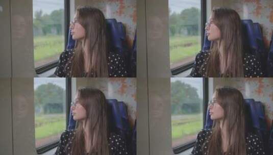 坐火车的女人看向窗外高清在线视频素材下载