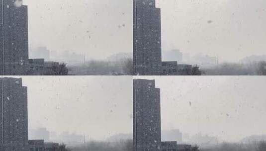 冬季里的城市灰色下雪雪中楼宇建筑烟筒 ~高清在线视频素材下载