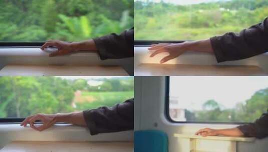 火车车窗旁灵动的男生的手高清在线视频素材下载