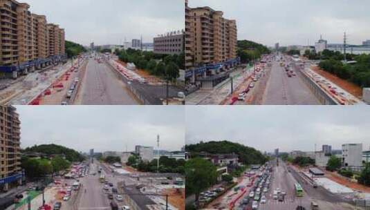 4k城市道路施工绿化改造路口车流高清在线视频素材下载