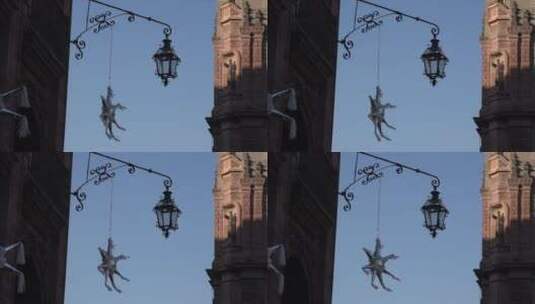建筑物上悬挂的吊灯特写镜头高清在线视频素材下载