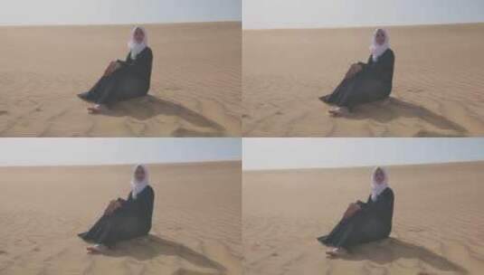 穆斯林坐在沙漠上高清在线视频素材下载