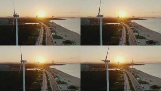 航拍风车海滩夕阳高清在线视频素材下载