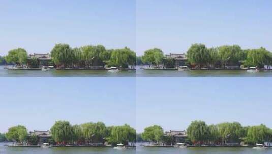 山东济南大明湖公园景区湖面景色与游船游客高清在线视频素材下载
