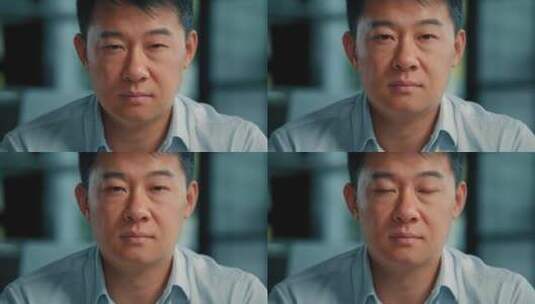 亚裔中年男士的面无表情的特写高清在线视频素材下载
