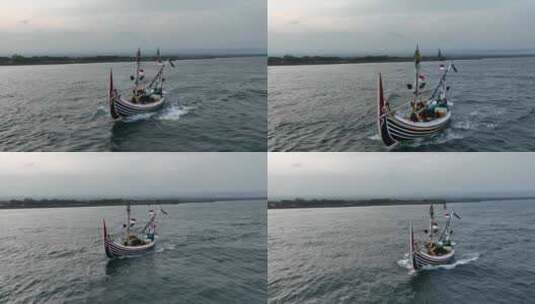 原创 印尼巴厘岛海上航行的渔船航拍风光高清在线视频素材下载