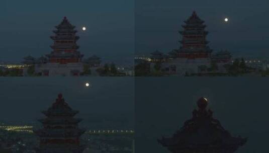 实拍月亮从楼阁升起高清在线视频素材下载