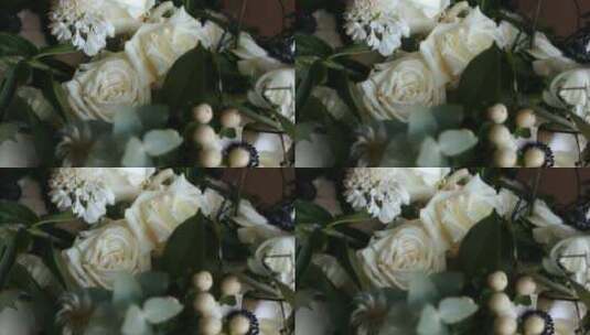 电影旋转中的白玫瑰婚礼花束。相机优雅地围高清在线视频素材下载