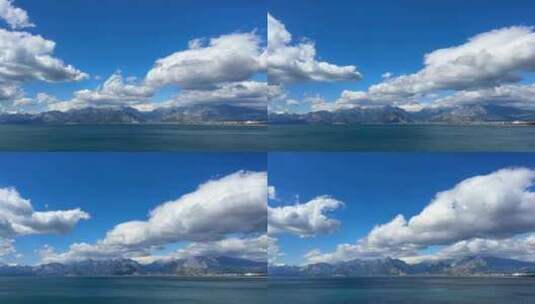 蓝天白云山脉海面延时摄影高清在线视频素材下载