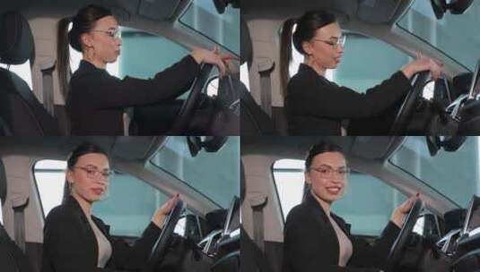 自信的年轻女商人坐在车内试驾高清在线视频素材下载
