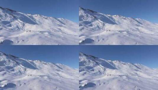 航拍新疆阿勒泰雪景吉木乃草原石城壮美雪山高清在线视频素材下载