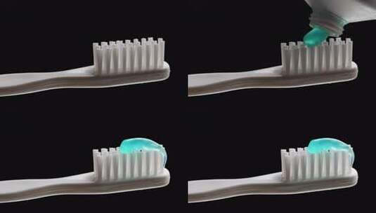 人在牙刷上挤牙膏高清在线视频素材下载