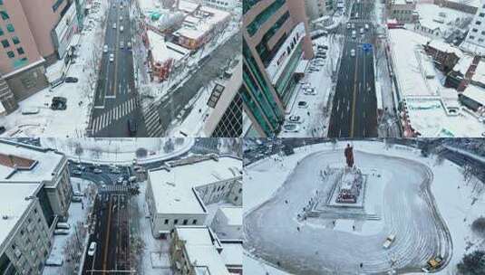 雪中街道航拍长镜头一镜到底中山路中山广场高清在线视频素材下载