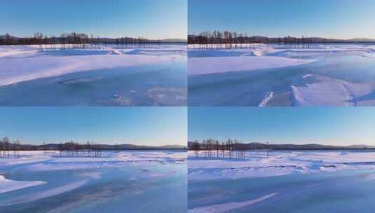 夕阳下内蒙古北方不冻河平静水面雪雾袅袅高清在线视频素材下载