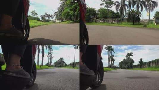 一个人骑踏板车在村子里转悠高清在线视频素材下载