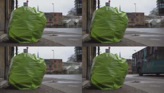城市公路旁放的垃圾袋高清在线视频素材下载