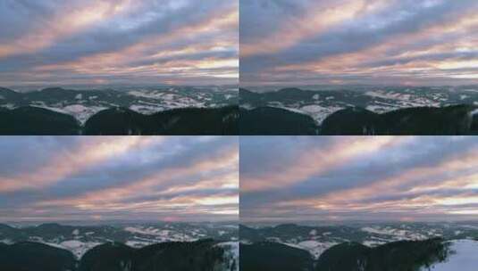 夕阳照亮了群山中的云彩高清在线视频素材下载