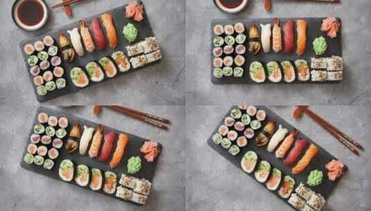 黑石板上美味的寿司卷高清在线视频素材下载