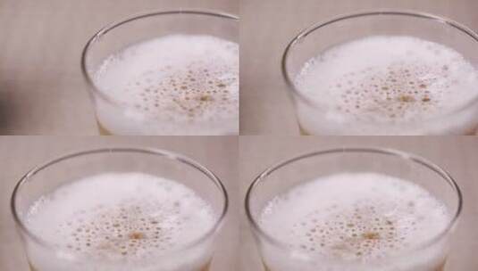 玻璃杯倒啤酒泡沫高清在线视频素材下载