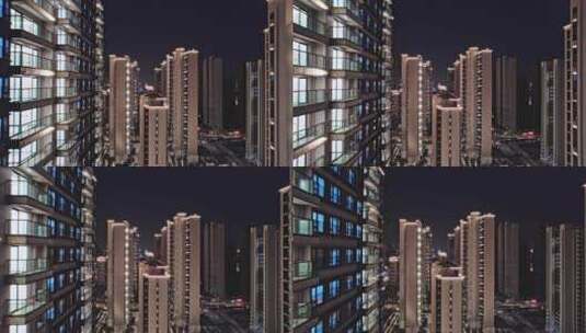 航拍夜晚新建楼盘高层住宅和园林景观夜景高清在线视频素材下载