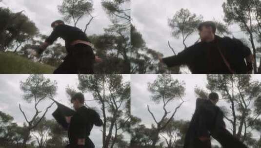 森林里舞蹈的男模特高清在线视频素材下载