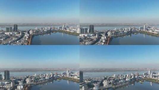 江西省九江市甘棠湖及长江的城市景观航拍高清在线视频素材下载