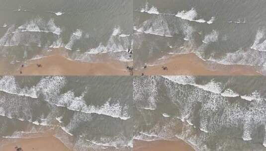 阴天沙滩海水浪花俯拍海边潮汐海水冲刷沙滩高清在线视频素材下载