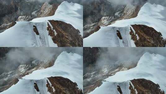 航拍攀登沙鲁里山脉尼登贡嘎雪山的登山者高清在线视频素材下载