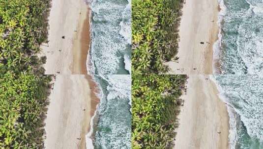俯瞰大海边海滩海浪拍打沙滩航拍高清在线视频素材下载