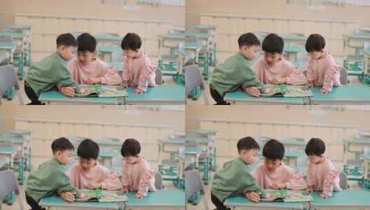 哥哥在教室里教弟弟妹妹看书慢镜头高清在线视频素材下载