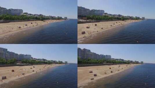 河岸城市沙滩上的鸟瞰图高清在线视频素材下载