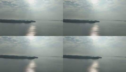 鄱阳湖航拍湖泊湿地公园逆光湖面太阳光湖水高清在线视频素材下载