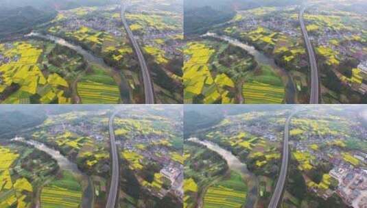 航拍中国基础建设高速公路穿越春天花海田野高清在线视频素材下载