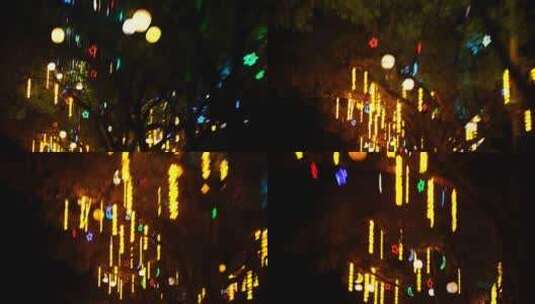 九江市滨江路夜晚道路景观街道树上装饰灯饰高清在线视频素材下载