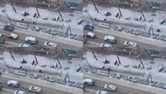 俯瞰城市下雪街头结冰路面行车2高清在线视频素材下载