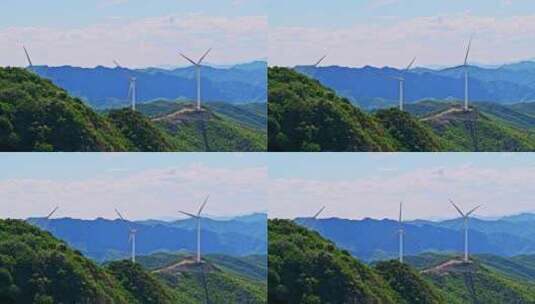 夏季绿色高山蓝天白云与风力发电机组高清在线视频素材下载