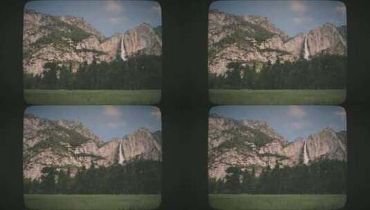 山与瀑布后面的一片树木8毫米电影风格高清在线视频素材下载