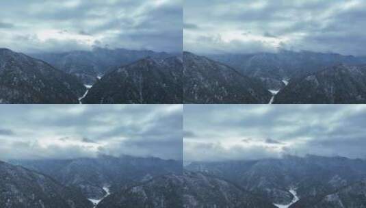航拍冬天户外雪景连绵不绝的山峰自然风景高清在线视频素材下载