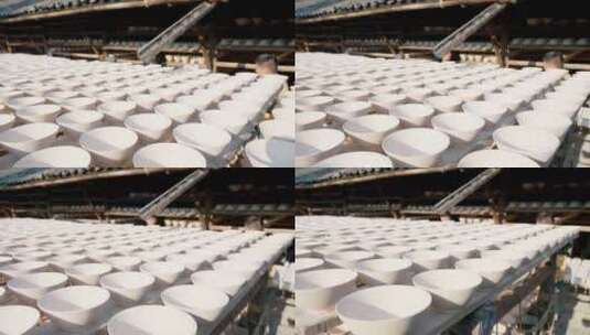 木架上的陶瓷碗坯素胚空镜运镜高清在线视频素材下载