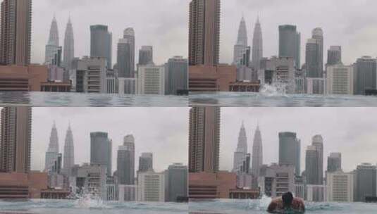 吉隆坡屋顶游泳池里游蝴蝶的家伙高清在线视频素材下载