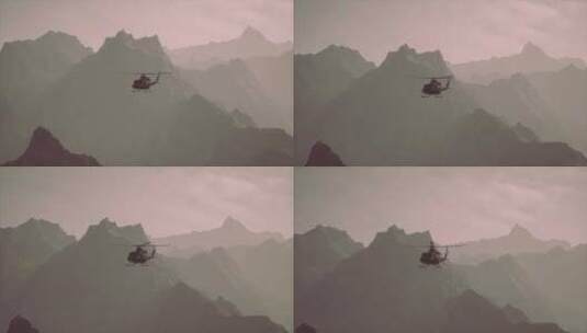 直升机在山脉上空飞行高清在线视频素材下载