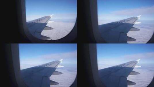 飞机高空穿越云层窗外美景高清在线视频素材下载