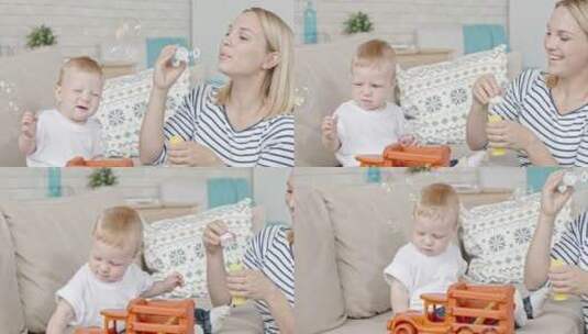 孩子和玩泡泡的母亲高清在线视频素材下载