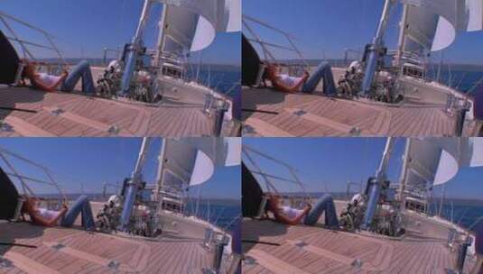 女人躺在帆船的甲板上高清在线视频素材下载