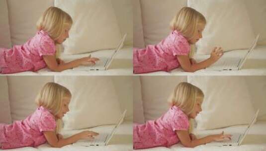 女孩用笔记本电脑高清在线视频素材下载