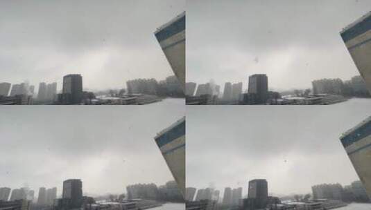 冬季里的城市灰色下雪雪中楼宇建筑烟筒 ~高清在线视频素材下载